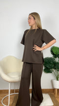Conjunto camiseta abierta con hombreras