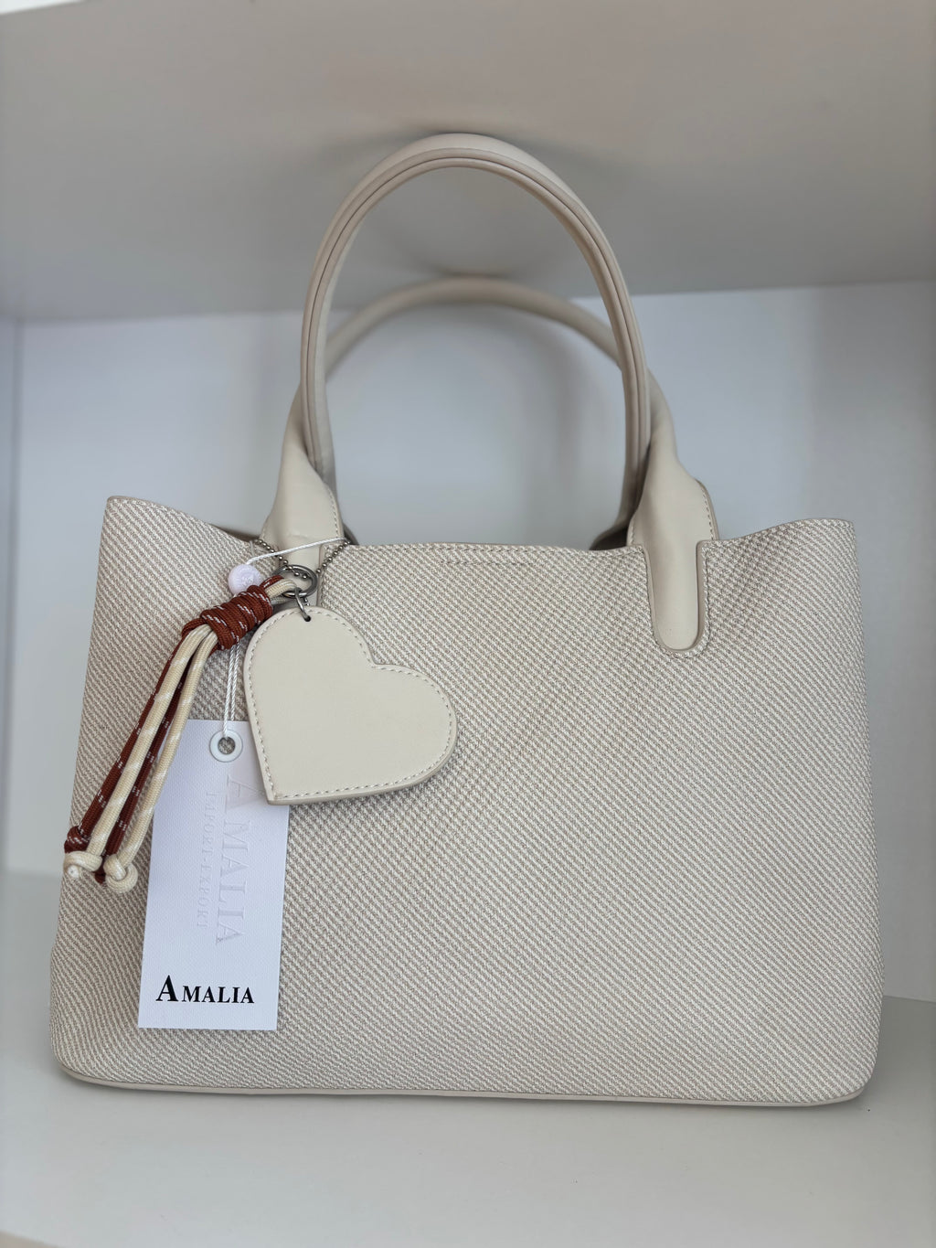 Bolso corazón beige