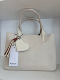 Bolso corazón beige