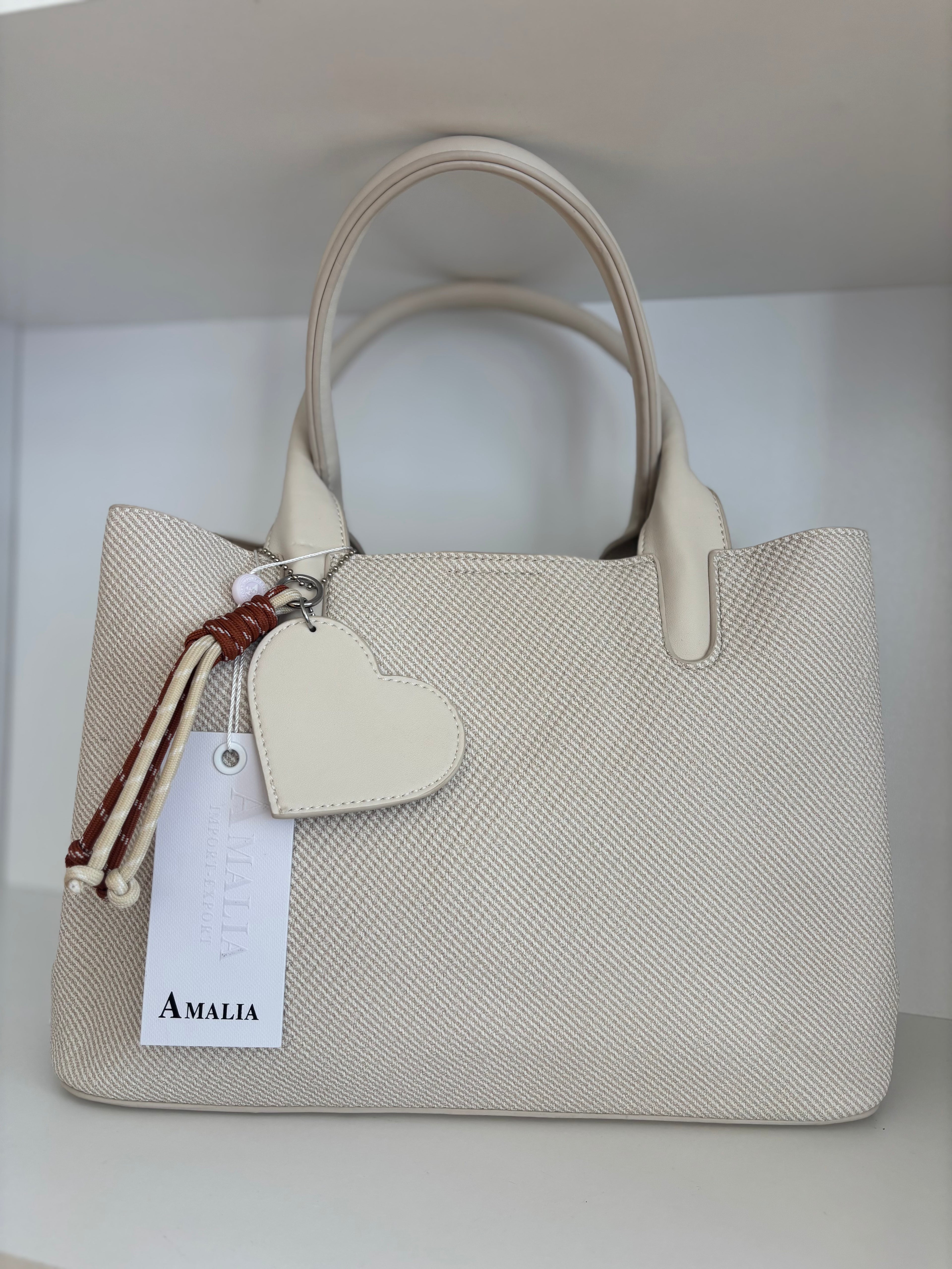 Bolso corazón beige
