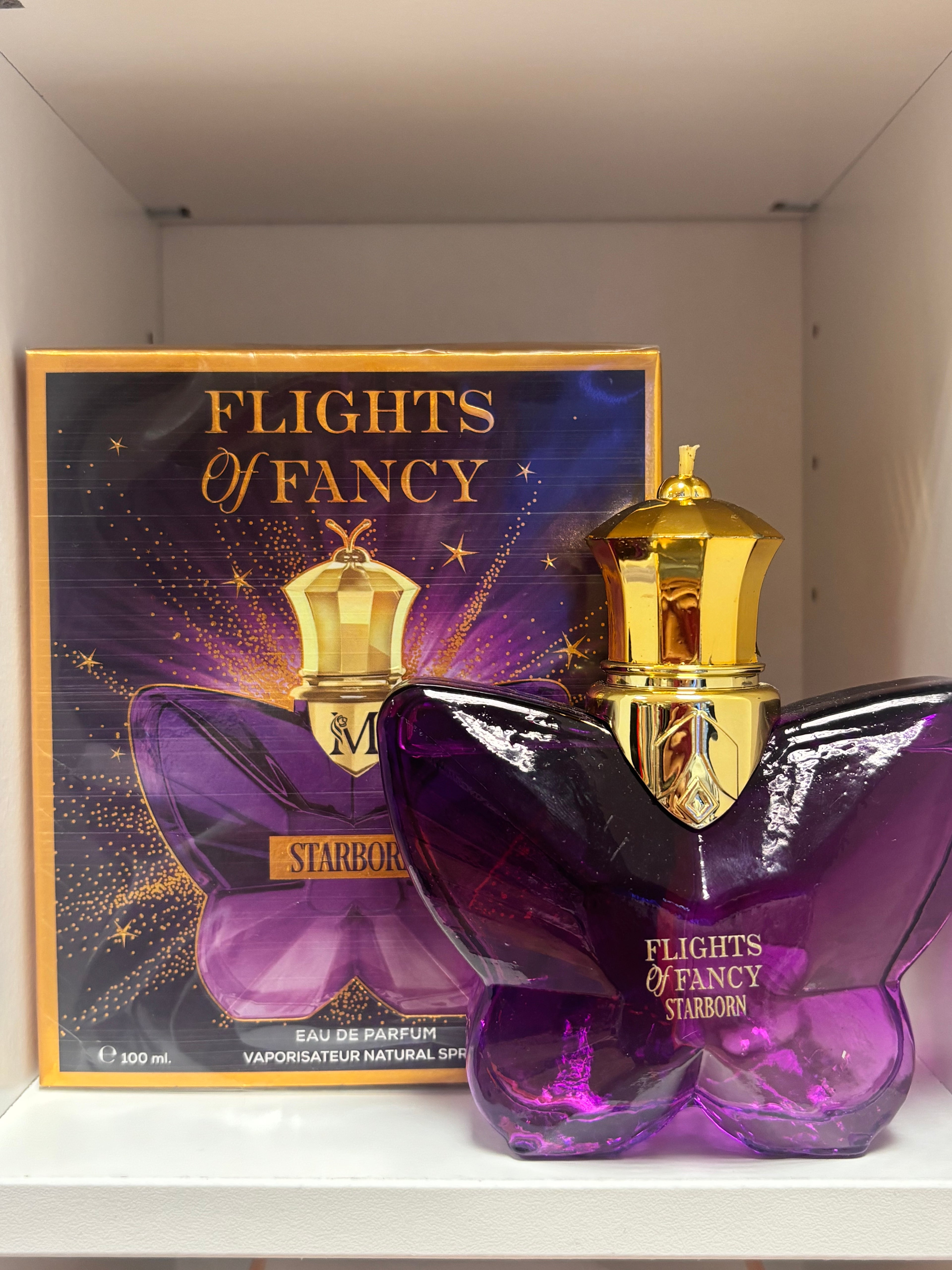 Perfume mariposa morada